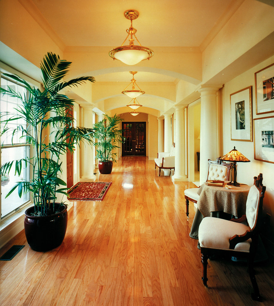 White Tuscan Wood Columns in Foyer