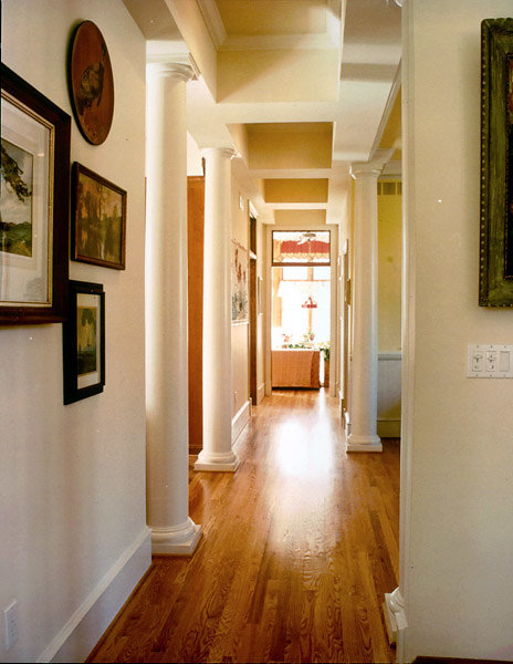 Smooth Tuscan Columns line a Hallway